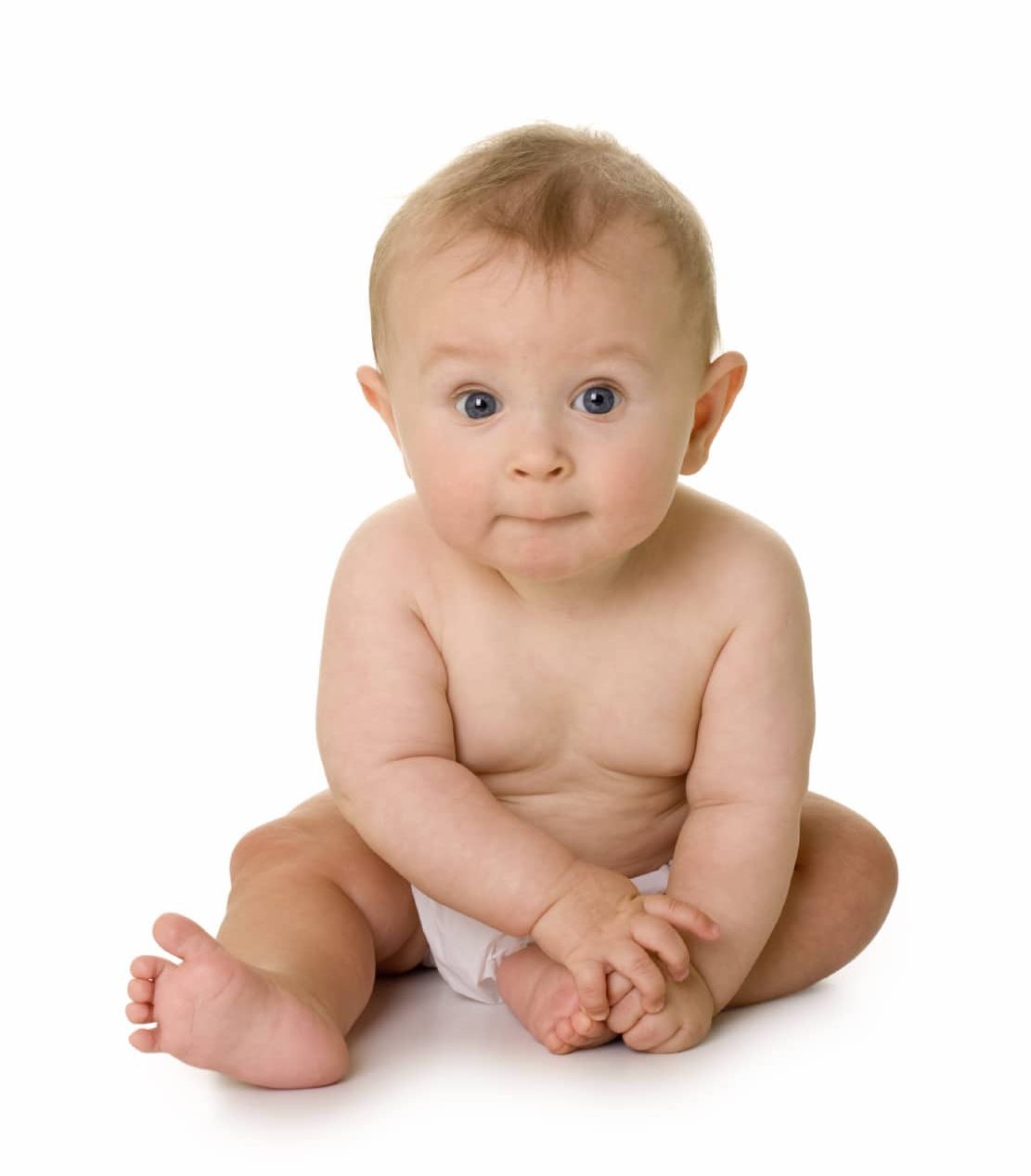 A child wearing only a diaper and sitting up